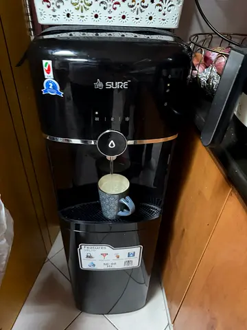 Hot Deal! Sure Touch water dispenser with bottom load for only AED 350/-