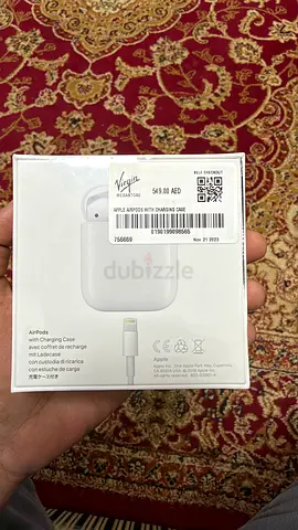 Apple AirPods with Charging Case (Sealed) - White negotiable