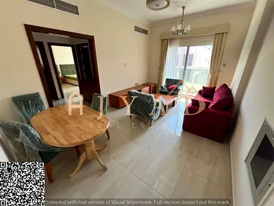 Annual rent in Ajman Al Jurf 2 | Furnished 2BR + Hall | Balcony | Central AC | Free WiFi | Near Dub