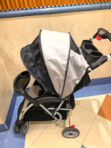 Lightweight Grey Compact One Hand Close Baby Stroller. Kolcraft. New. Unused. Worth AED. 900.