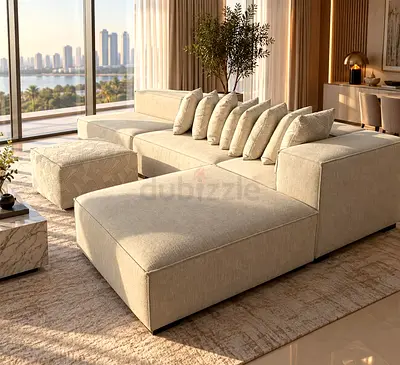 Large L-shaped modular beige sofa with ottoman - excellent condition