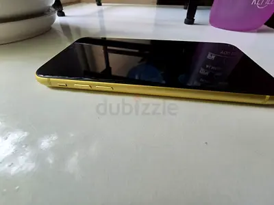 Used yellow iPhone with screen in good condition