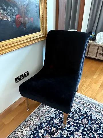 Two navy velvet slipper chairs, AED 75 each or AED 100 for the pair