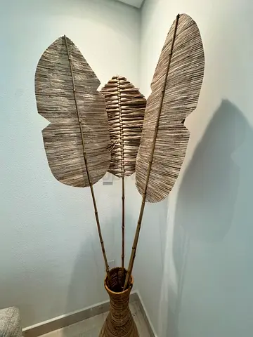 Decorative Rattan Floor Arrangement with Tall Leaf Stems in Vase