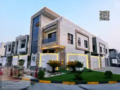 Villa for sale in Ajman, Al Zahia, corner lot, including registration fees. 6 master bedrooms, livin