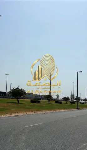 Commercial land for sale, first-row location on Maliha Road in the Al-Hoshi area, Sharjah.