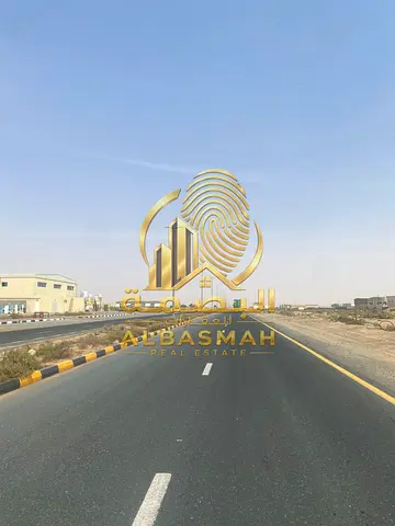 For Sale – Commercial Corner Land on a Main Road in Al Dhaid – Suhaila | Commercial District