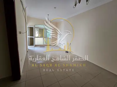 One-bedroom apartment with a living room for annual rent in Al-Qulai'ah; features a balcony and two bathrooms.
