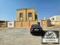 Villa for rent in Al Zahia: 4 master bedrooms, a majlis, a living room, and a small roof terrace.
