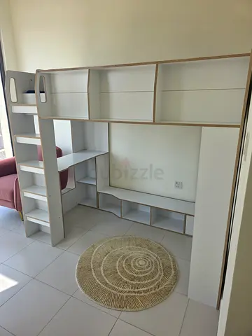 White loft bed with built-in shelving and TV/storage unit. 90x190 bed size