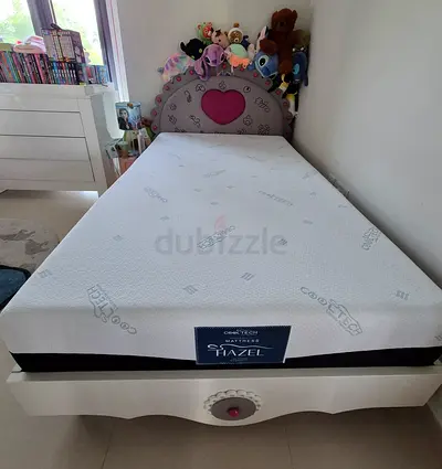 Bed and chest of drawers