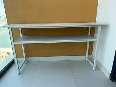 White slim console table with lower shelf - good condition