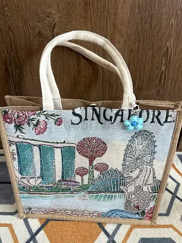 Beach-style jute tote bag with Singapore tapestry print, good condition