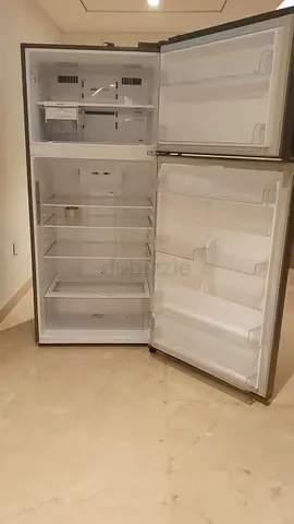 Used double-door refrigerator in good working condition