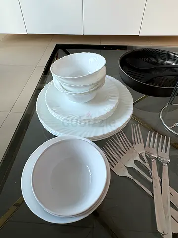 Set of white dinnerware plates and bowls - good condition