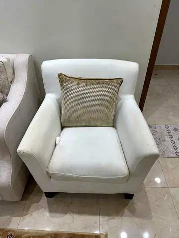 Used white upholstered single armchair with cushion - good condition