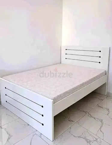 Single white wooden bed frame with mattress - good condition