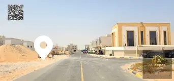 Residential/Investment land for sale in Al Zahia; second plot from the main road