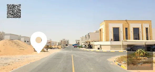 Residential/Investment land for sale in Al Zahia; second plot from the main road