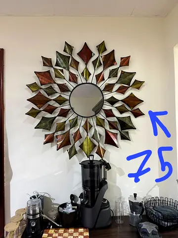 Decorative Sunburst Leaf Wall Mirror - Metal Accent (75 AED)