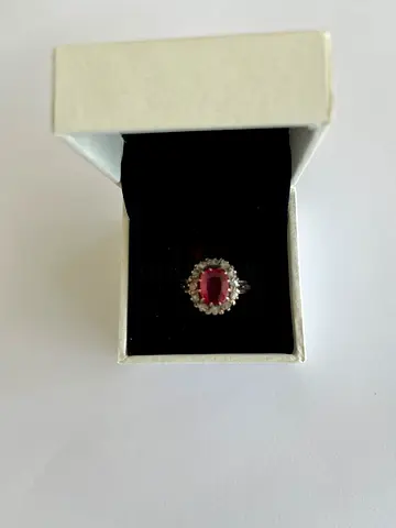 Gold ring with red ruby and diamonds