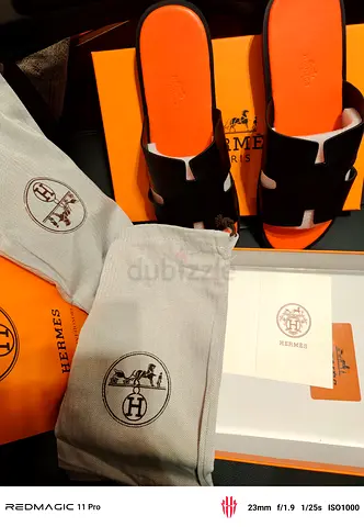 Hermès Oran Slide Sandals — Orange Insole, Black Strap ( New)