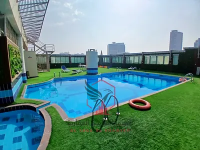 Luxury Sea View Four-Bedroom Apartment with Full Sea Views, Owner-Paid AC, Free Parking, Gym and Swimming Pool for Annual Rent in Al Majaz 2