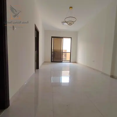 For annual rent in Ajman a brand new one-bedroom apartment, first occupancy, excellent size, and prime location combining comfort and easy access