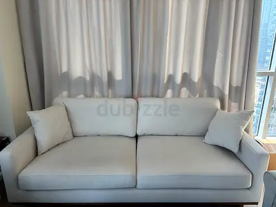 Cream 2-seater Sofa in Good Condition