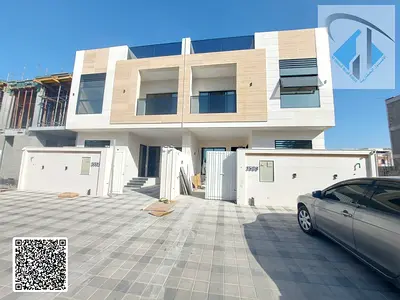 Villa with an internal roof terrace, freehold ownership, all utilities included, registration and ownership fees included, excellent location close to