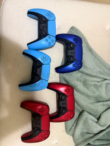 Five PS5 DualSense Wireless Controllers - Assorted Blue & Red Colors (Used)