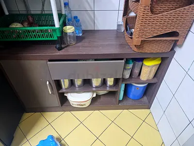 Compact kitchen storage cabinet with shelves and cupboard - dark wood finish