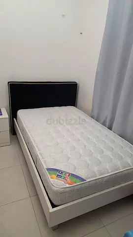 IKEA Single bed frame with new mattress and upholstered headboard - Excellent condition