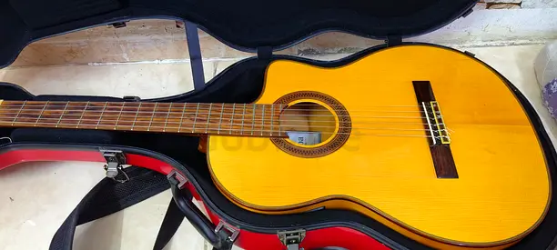 Used classical acoustic guitar with case - good condition