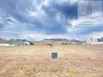 للبيع ارضين سكني فلل موقع مميز واطلالة جبلية مصفوت1 قريبة من الخدمات تملك مواطن وخليجي