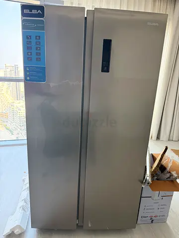NEW refrigerator/freezer - spacious double-door unit