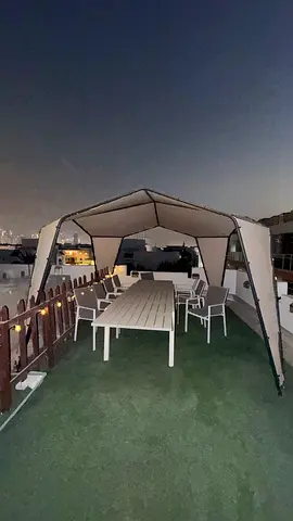 Outdoor Gazebo Canopy with Dining Table and 12 Chairs - excellent Condition.