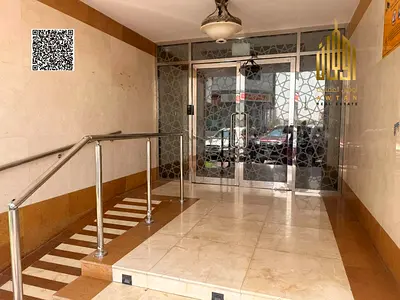 *بناية حديثة مميزة سكني تجاري بمنطقة الجرف عجمان