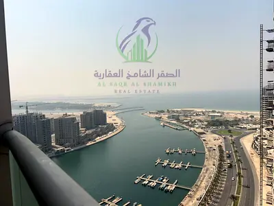 Two bedroom apartment for annual rent in Al Khan Sharjah balcony sea view wall closets master bedrooms spacious modern finish great location and acces