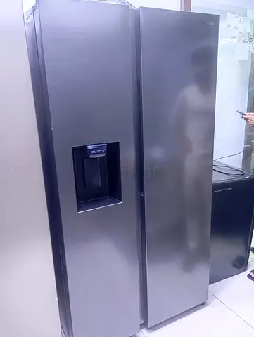 Samsung latest model Large side-by-side stainless steel refrigerator with water dispenser