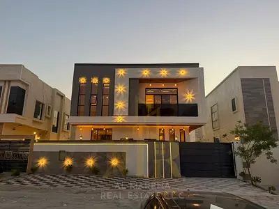 ** فخامة تبدأ من الواجهة | فيلا راقية للبيع في الحليو - عجمان** امتلك منزل الأحلام الفاخر الذي يجمع بين التصميم العصري الراقي، والمساحات الواسعة، ا **