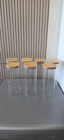 Set of 7 Tall Clear Glass Storage Jars with Wooden Lids