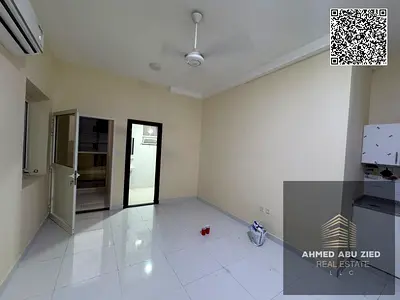 Brand-new studio for yearly rent in Al Alia, Ajman. Balcony, family building, near MBZ Road. AED 18,000 yearly, 4 or 6 cheques, security cheque.