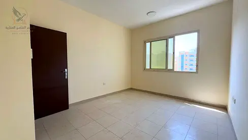 Two-bedroom apartment with a living room and balcony in Al-Rashidiyah 2, near the Ladies' Park and Hashim Mill.