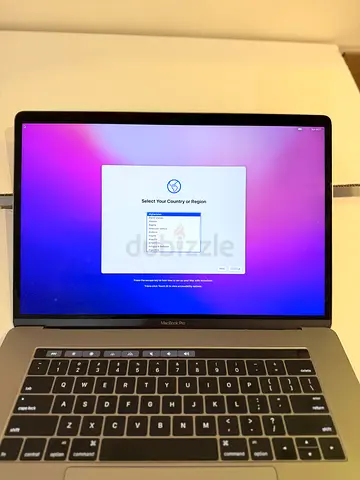 MacBook Pro Intel 2016 15-inc with touchbar (swollen battery, fully working, still charges properly)