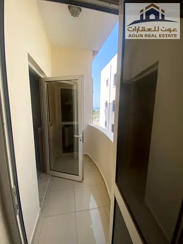 🏠 1 Bedroom + Living Room in Al Qulai'ah 🌿 Balcony ❄️ Central A/C 🚿 2 Bathrooms 💰 Annual Rent: AED 30,000 📅 Payment: 4 or 6 installments 💵