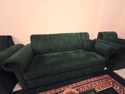 Dark green velvet 3-seater sofa with matching armchairs - good condition