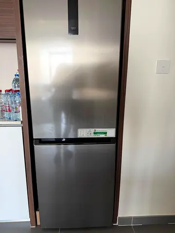 Silver two-door fridge/freezer in good condition