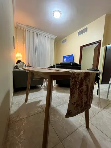 Wooden dining table - 4 seater