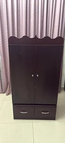 Dark Wood 2-Door Wardrobe with Drawers - Good Condition used as Mandir .price negotiable